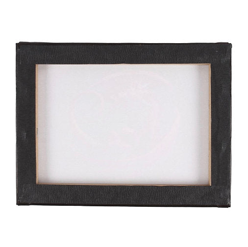 This image shows the back of the printed canvas with the material stretched over a rectangular wooden frame and finished with a sleek black tape.